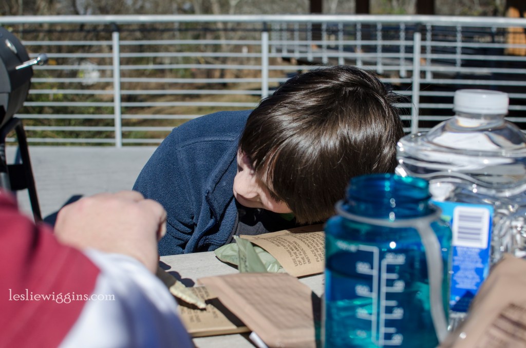 Noah, listening to a chemical reaction cook his lunch